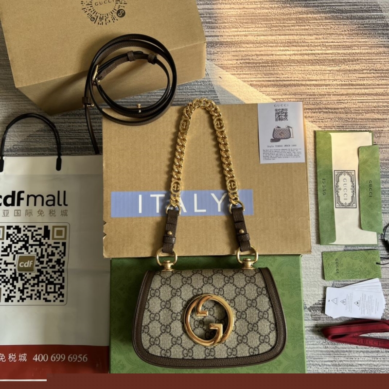 G*u*i top handle bags